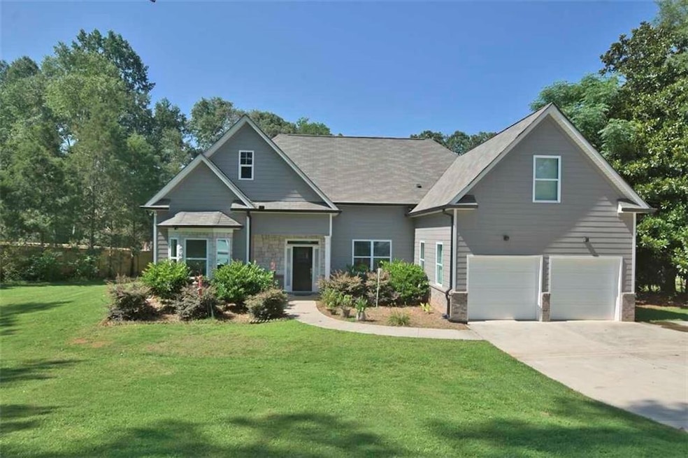 Lovely Four Bedroom Ranch Home on 1.57 Acres lot plenty of room for a pool, additional workshop or guest house.