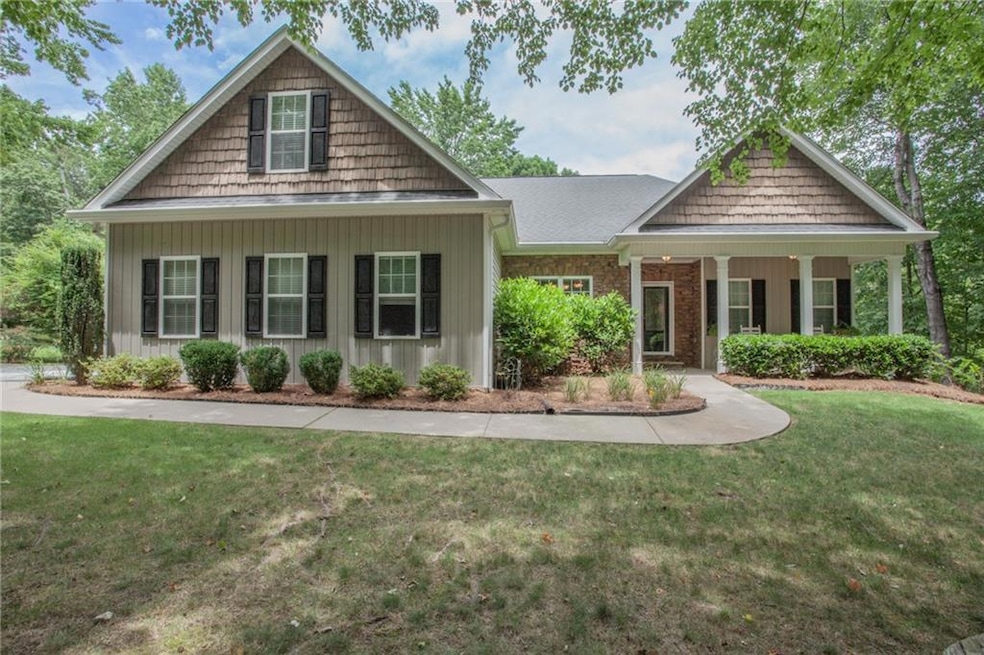 Craftsman house with a front yard
