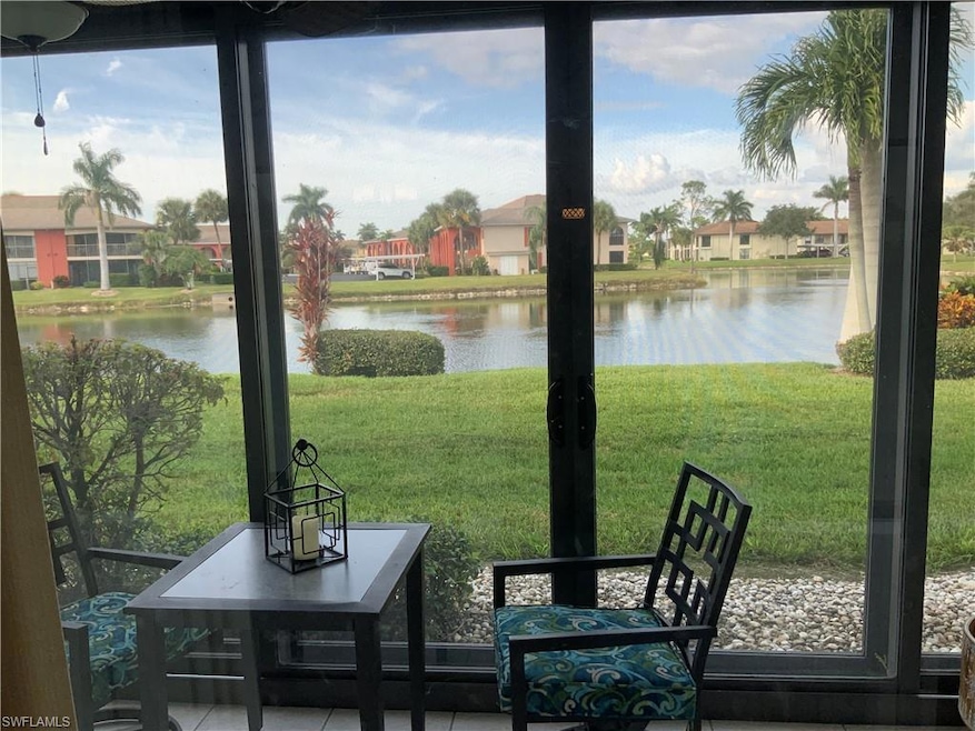 View of yard with a water view
