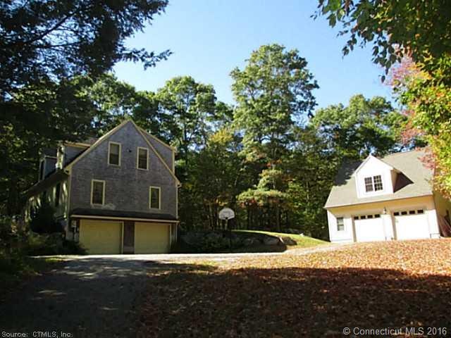 Exterior Front. Showing House and Barn