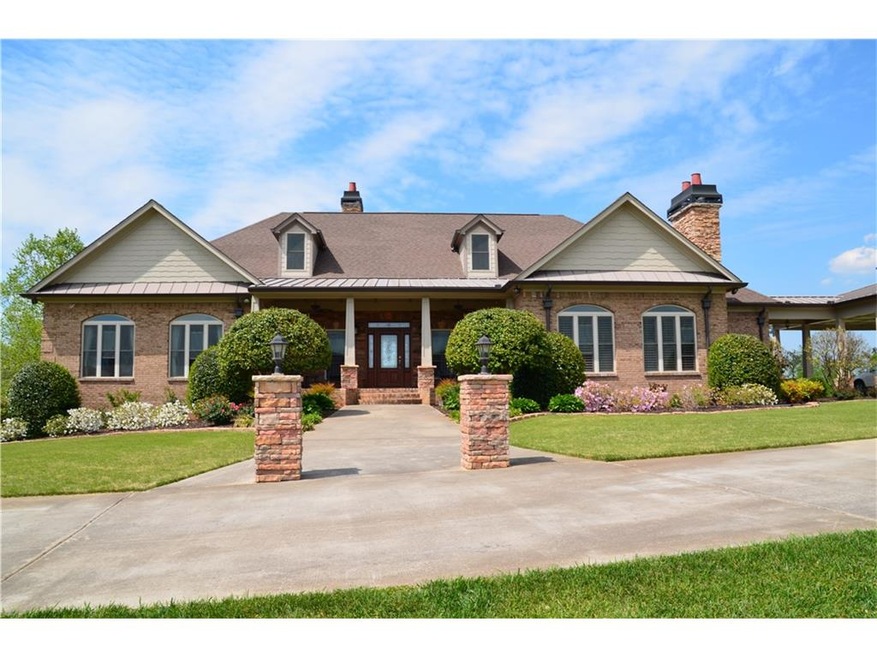 Beautiful home on 5.88 acres.  Perfect porch for s