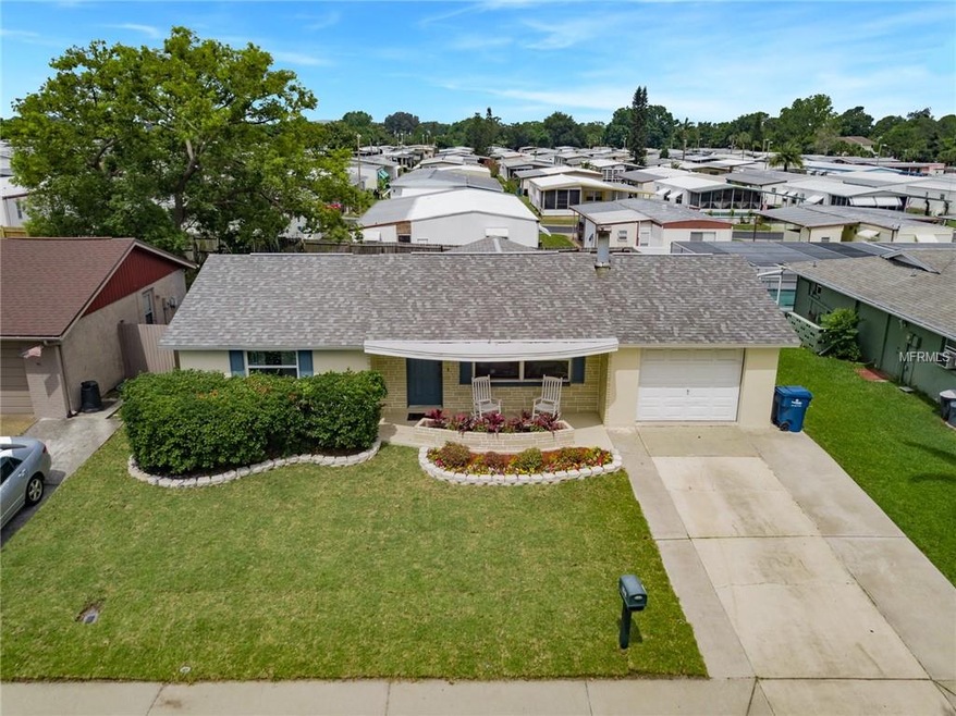 Aerial Photo of Front Exterior of Home with Fresh,