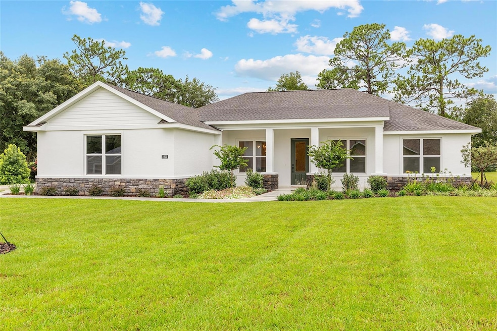 5912 NE 57th Loop, Silver Springs, FL 34488 - photo 1