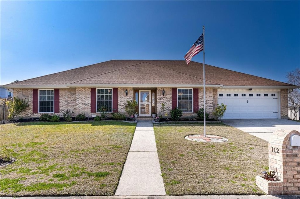 Front of beautiful house, all brick with concrete