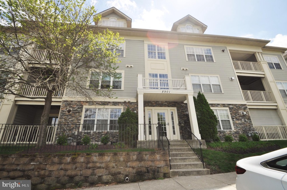 8901 Stone Creek Place unit 304, Pikesville, MD 21208 - photo 1