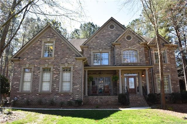 Front view of brick home on Beacon Crest Lane that