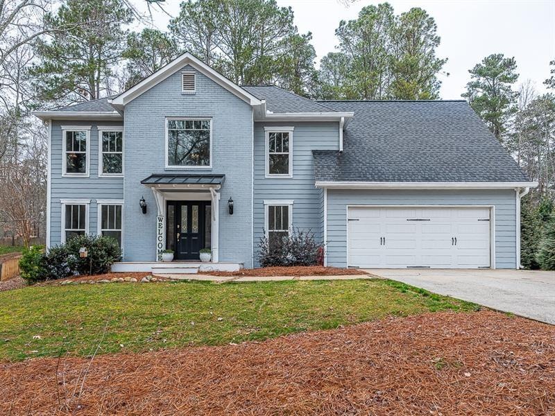 Charming curb appeal, set back from quiet street