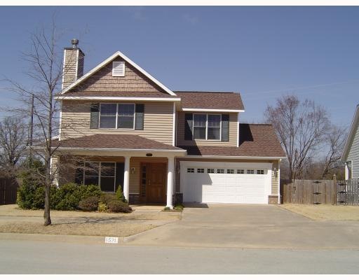 Exterior Front. Neutral earthtone facade, maintenance free exterior