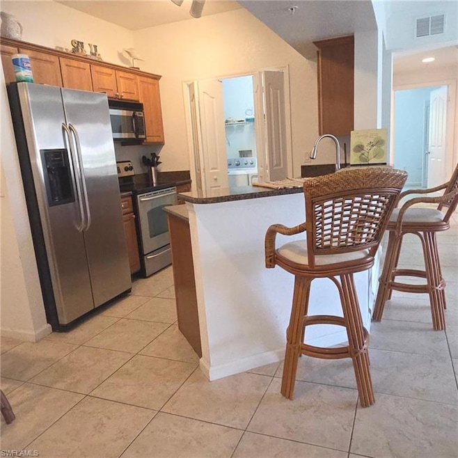 12975 Positano Cir unit 207, Naples, FL 34105 - photo 1