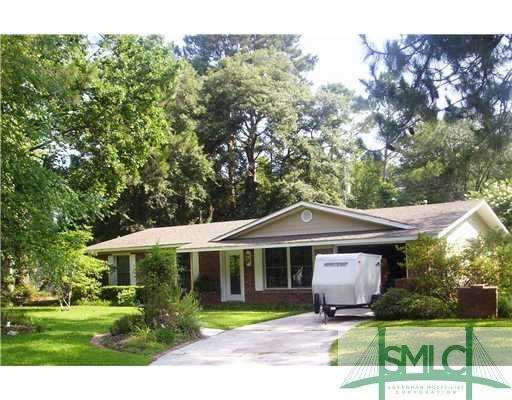 Exterior Front. BRICK W/HARDI-PLANK TRIM. LUSH LAN