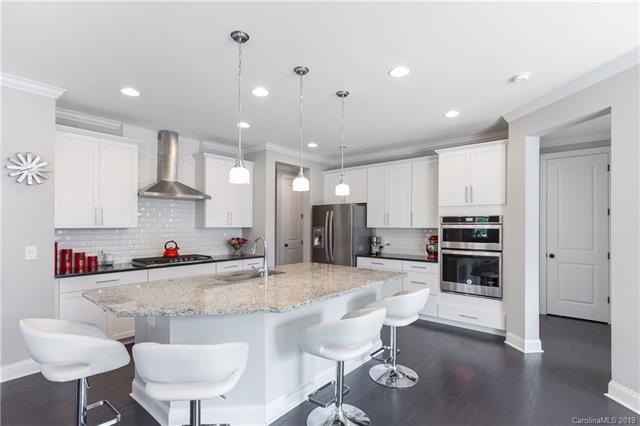 This beautiful kitchen features upgraded cabinets,
