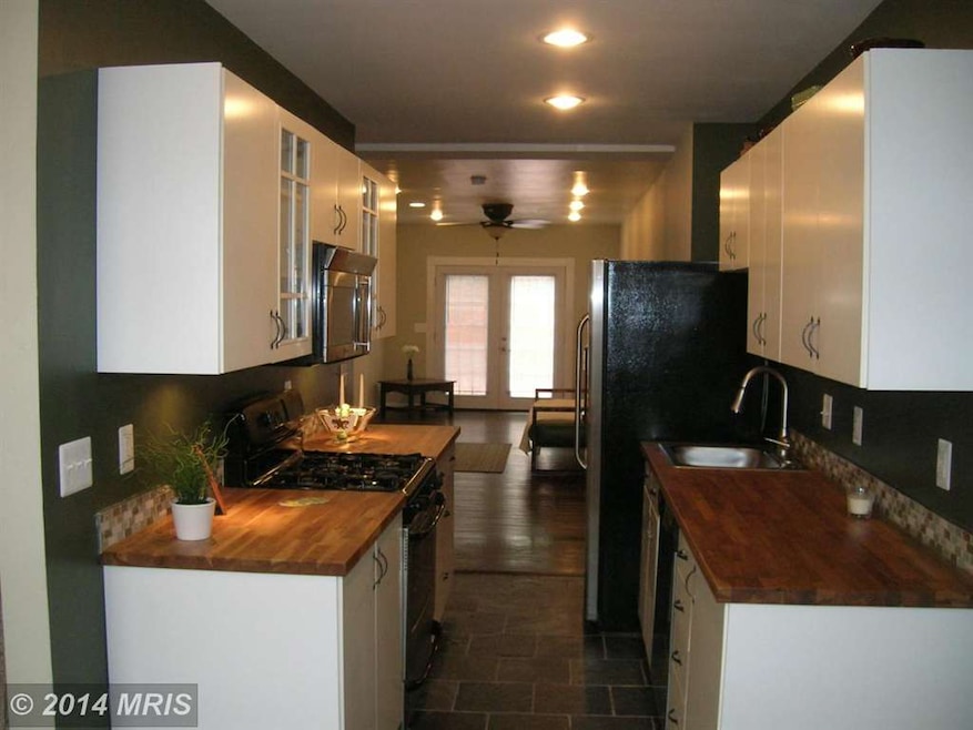 1108 W Lombard St, Baltimore, MD 21223 - photo 1