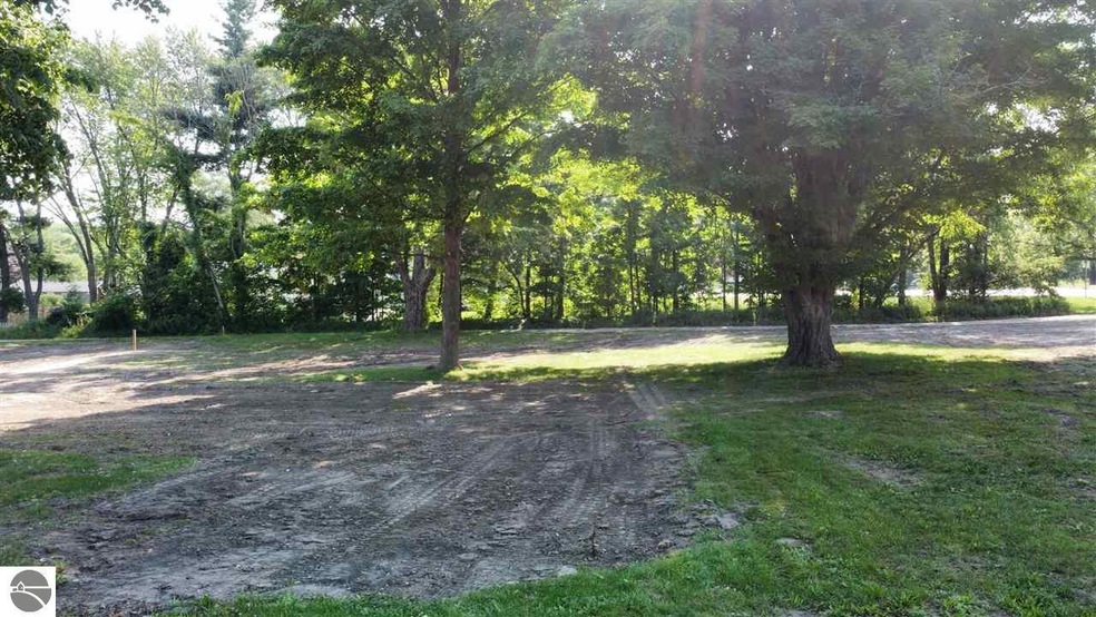 104 Iroquois St unit C, Elk Rapids, MI 49629 - photo 1