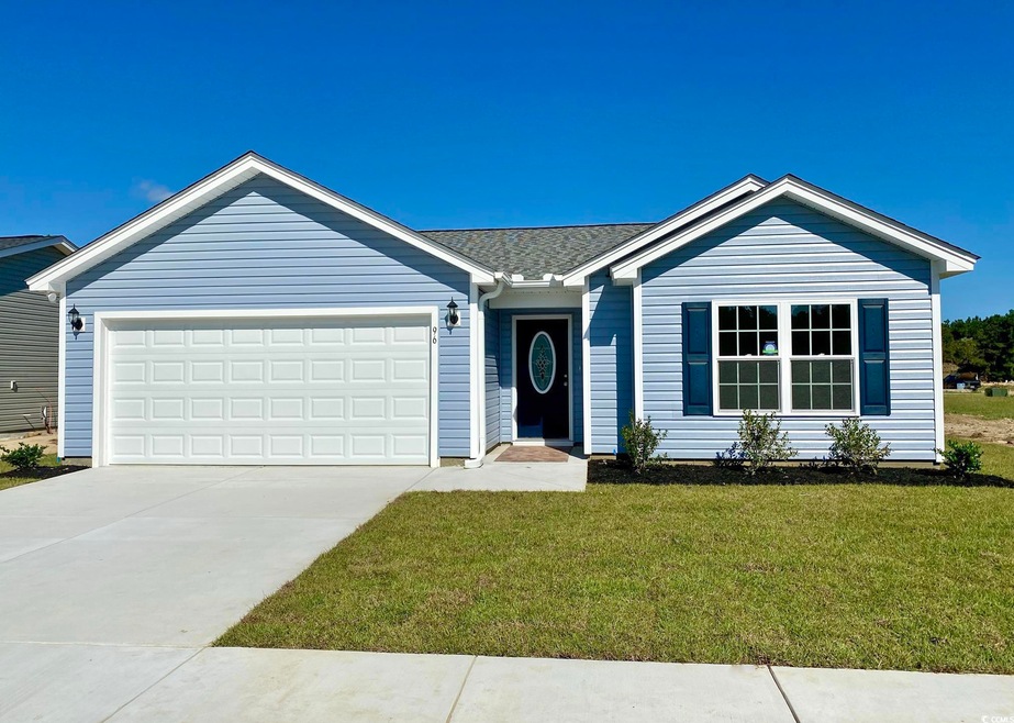 Single story home featuring driveway, a garage, a 