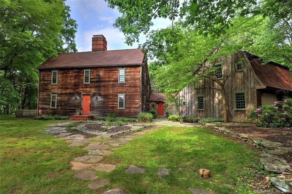 Front of house featuring a heart shaped stone work
