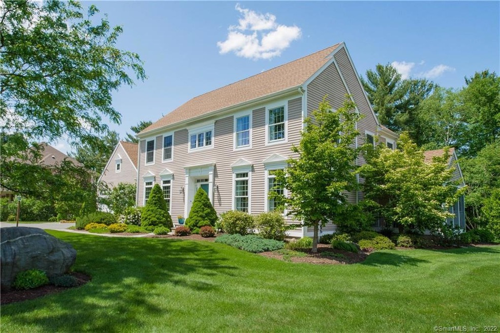 This pristine colonial is situated on a beautiful 