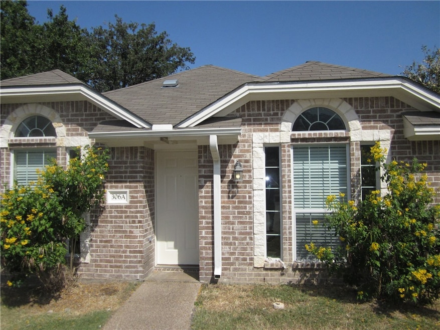 306 Fairway Dr unit A, Bryan, TX 77801 - photo 1