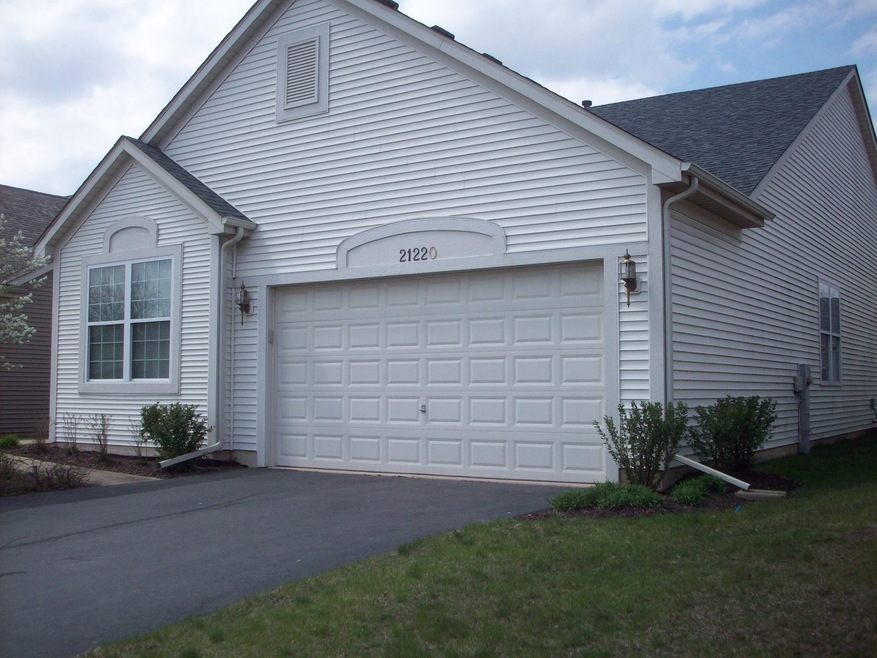 2 Car Garage with attic storage.