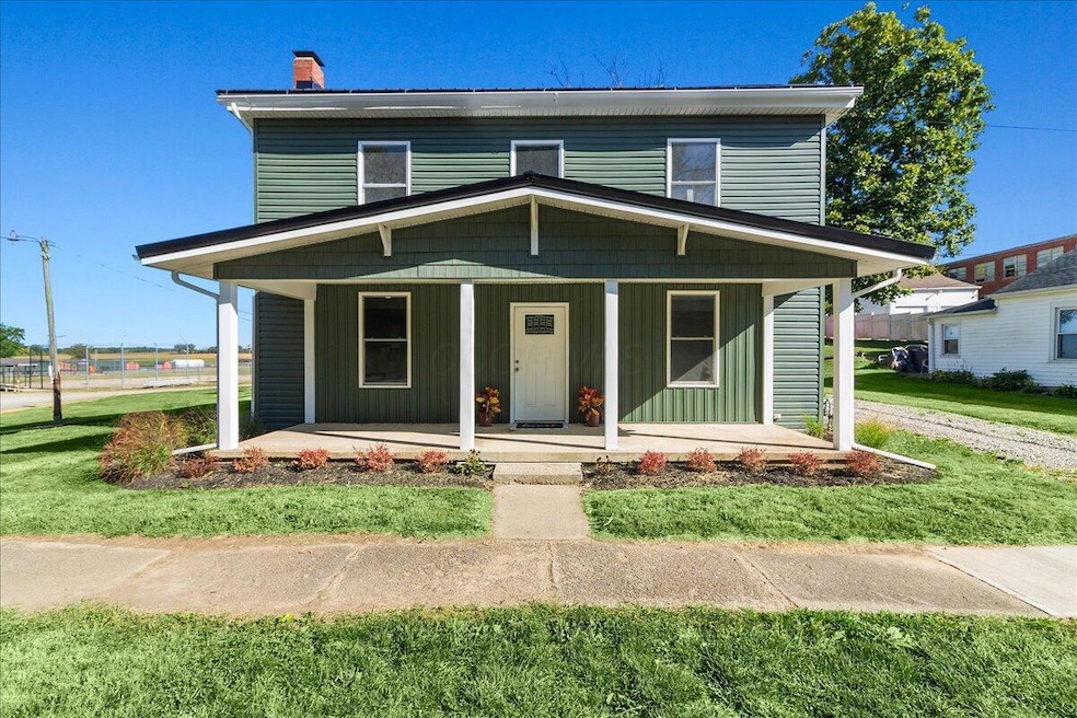 512 W Columbus St, West Liberty, OH 43357 - photo 1