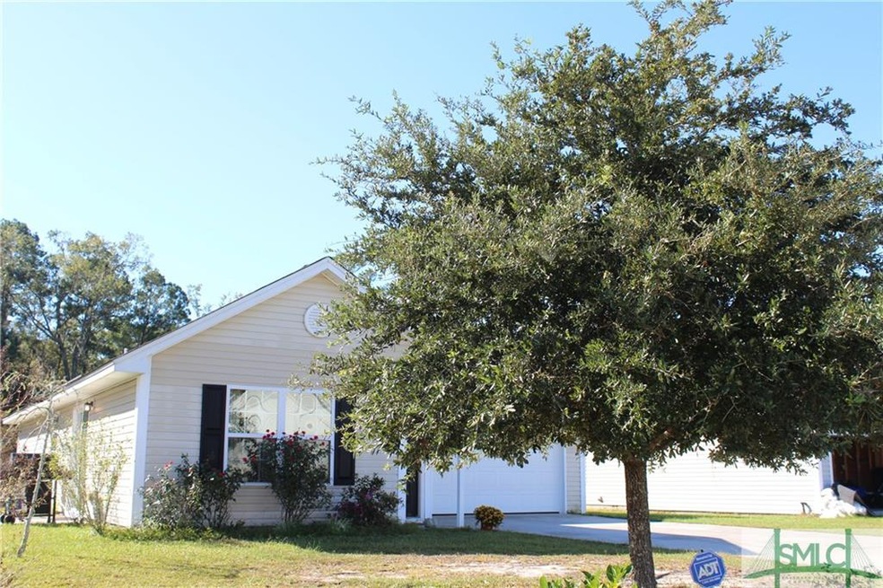 Situated on quiet street with backyard overlooking