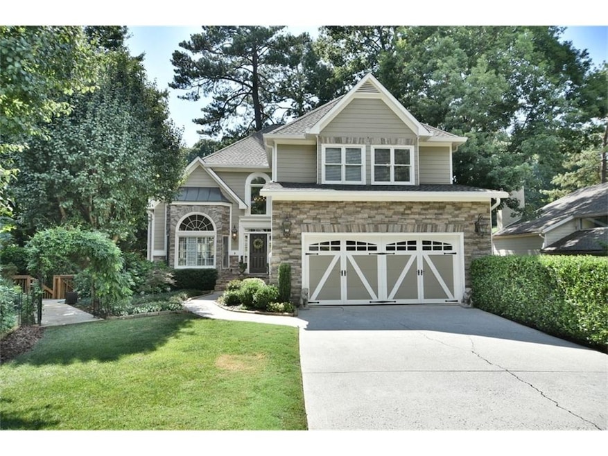 Gorgeous stone and hardie plank siding.
