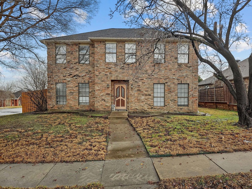 View of front of property with a front lawn
