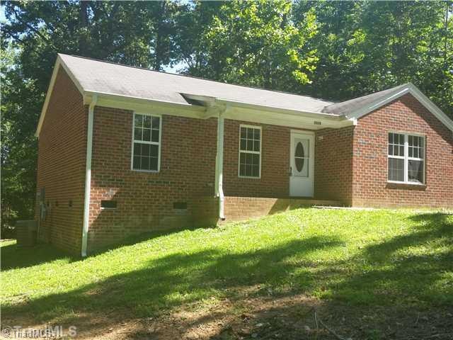 Exterior Front. Tree s remove in front and back