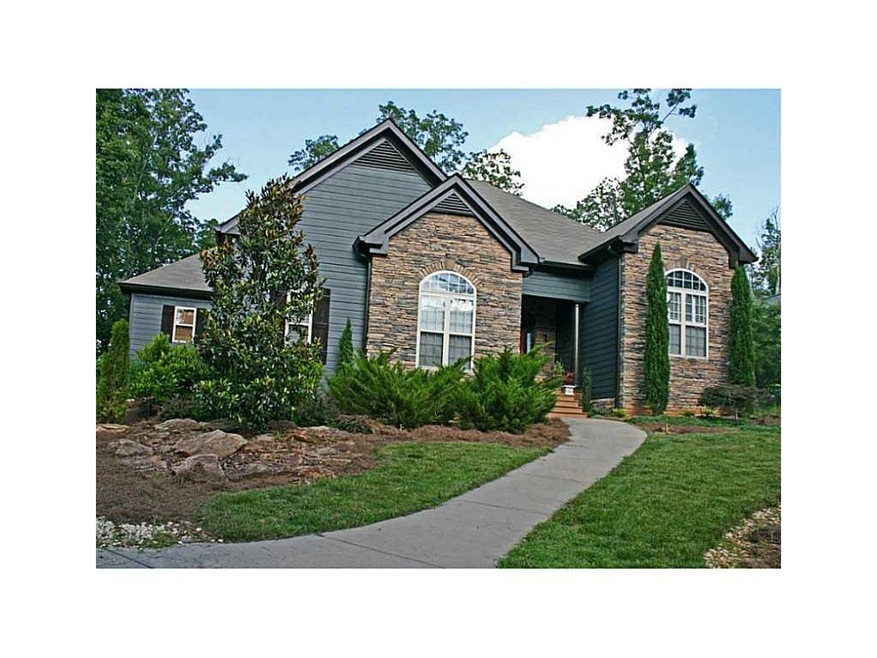 Exterior Front. Outstanding stone accented Craftsm