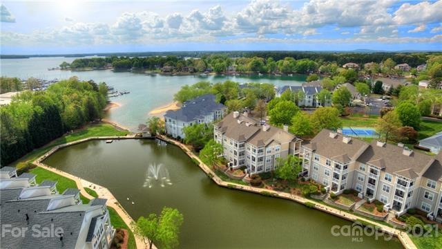 JUST A SHORT WALK TO THE SHORELINE OF LAKE NORMAN FROM THIS CONDO.  YOU HAVE A LONG RANGE VIEW OF POND AND WINTER VIEW OUT TO LAKE.