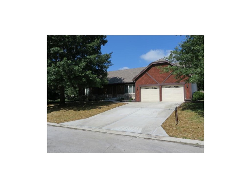 Notice the new driveway and front porch.