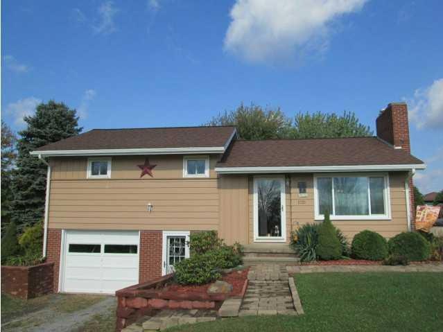 Exterior Front. Nice level lot on a quiet street.