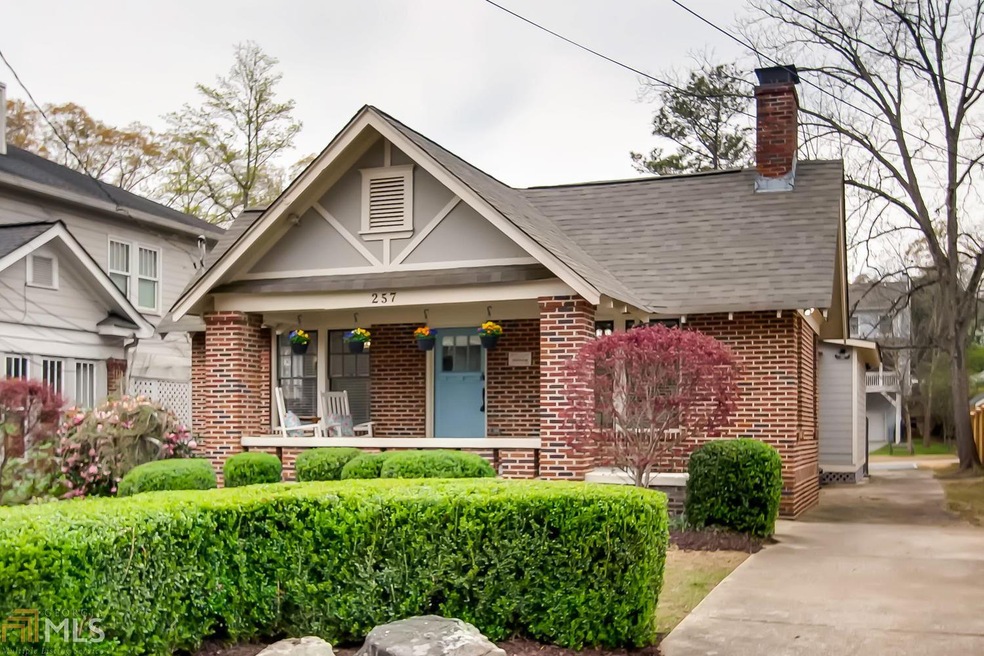 From the porchâ€™s broad brick columns, to the roo