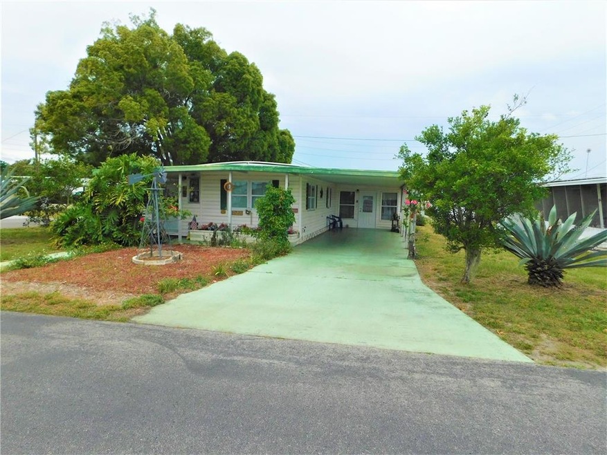 This home is located on corner lot of Betmar 55 pl