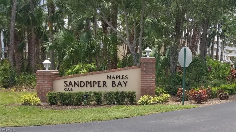 3061 Sandpiper Bay Cir unit 301, Naples, FL 34112 - photo 1
