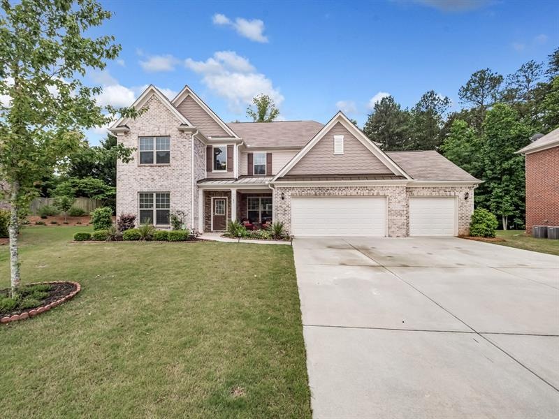 GORGEOUS 3 SIDED BRICK 3 CAR GARAGE MOVE IN READY 