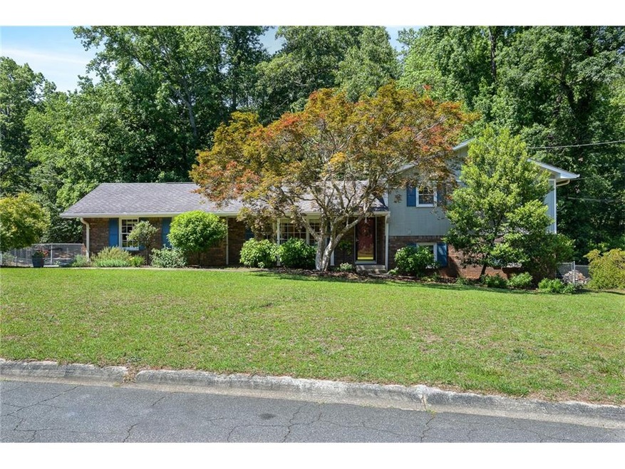 Great corner lot allows for side-entry garage.  La