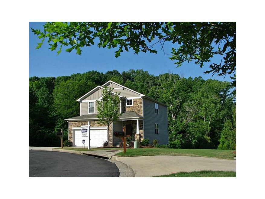 Exterior Front. Large cul-de-sac lot backs up to w