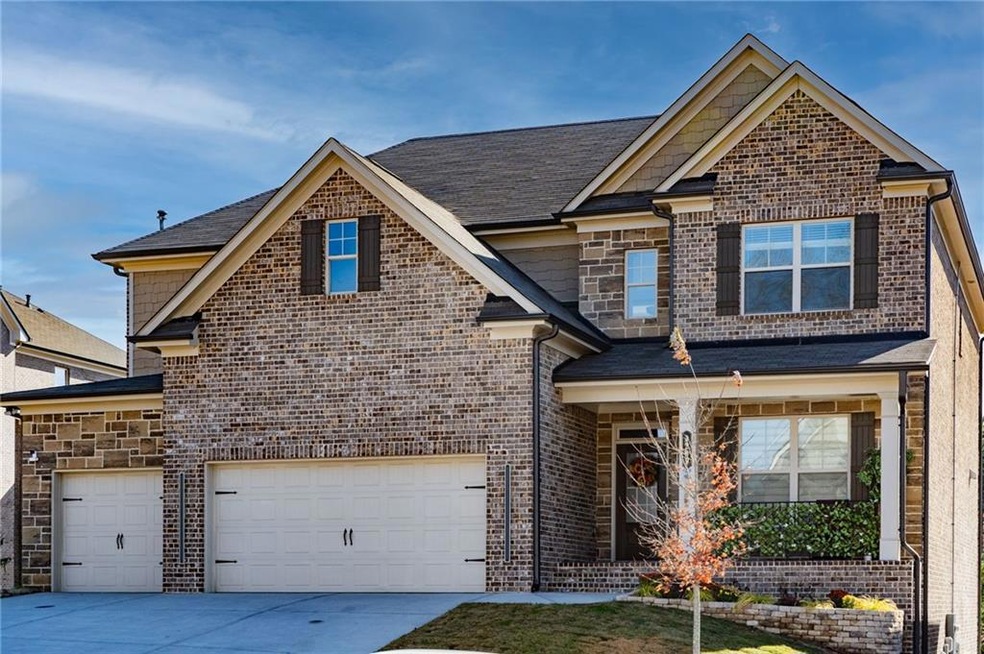 View of front of property featuring a garage