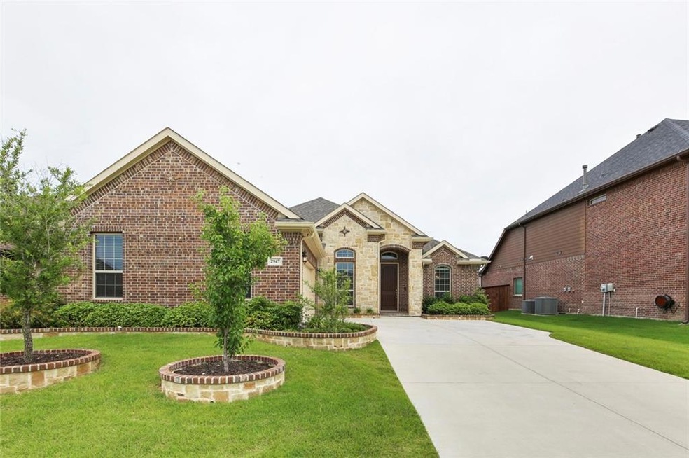 This home has been landscaped with finesse, and BE