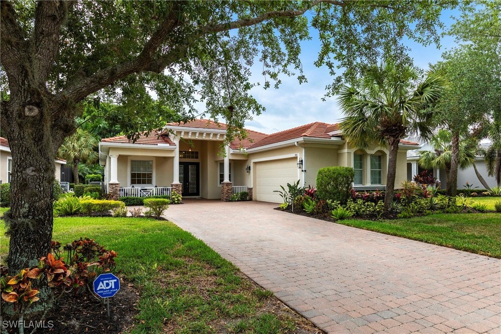 View of front facade featuring stucco siding, an a
