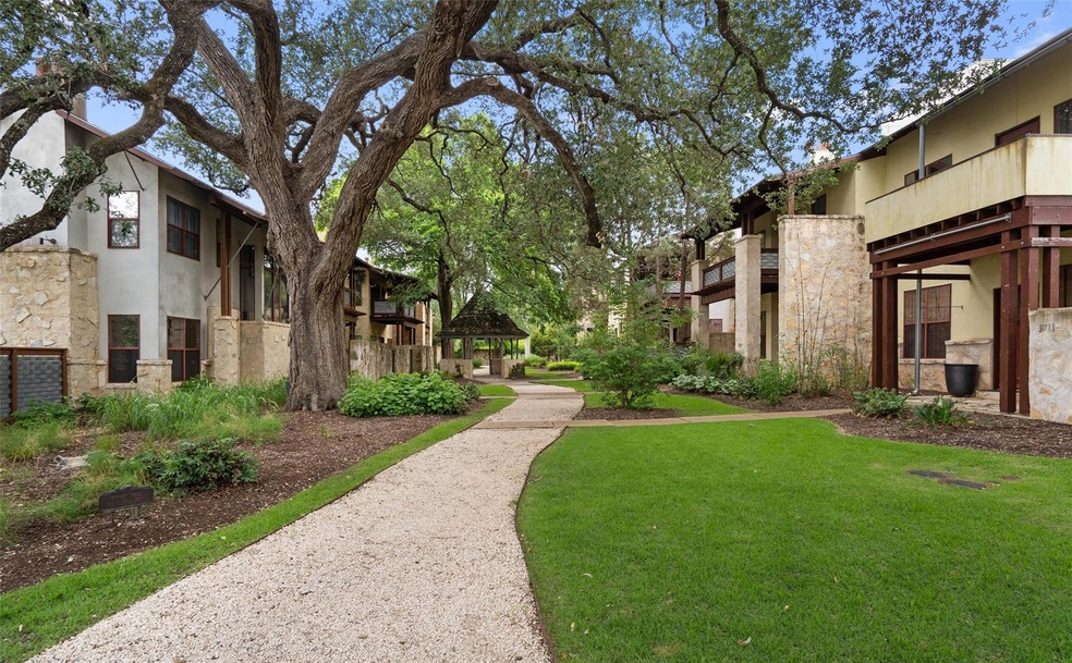 Surrounding community with a lawn and a gazebo