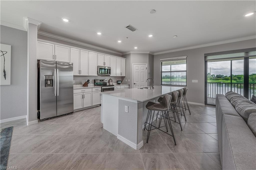 Kitchen featuring appliances with stainless steel 