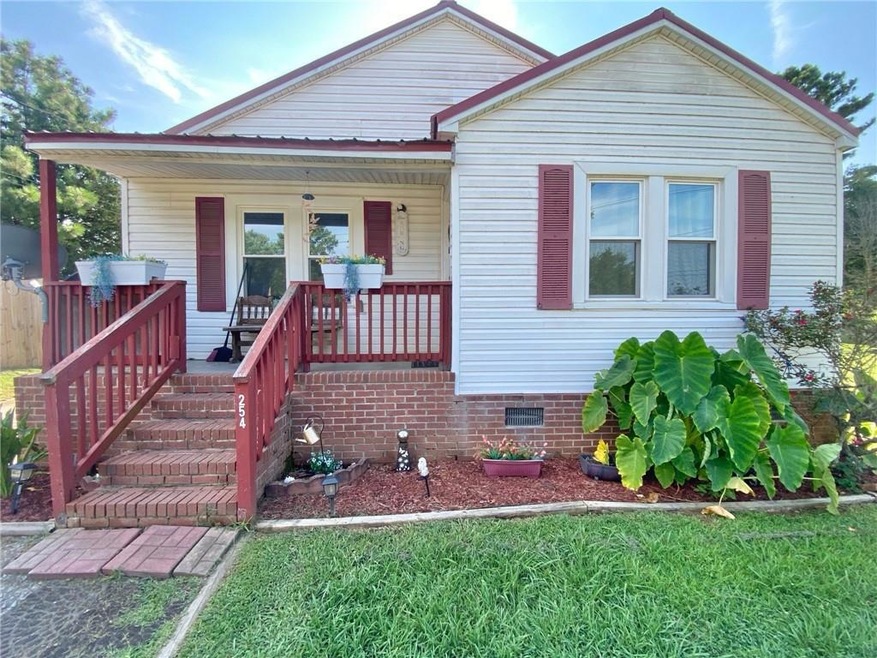 Bungalow-style home with covered porch