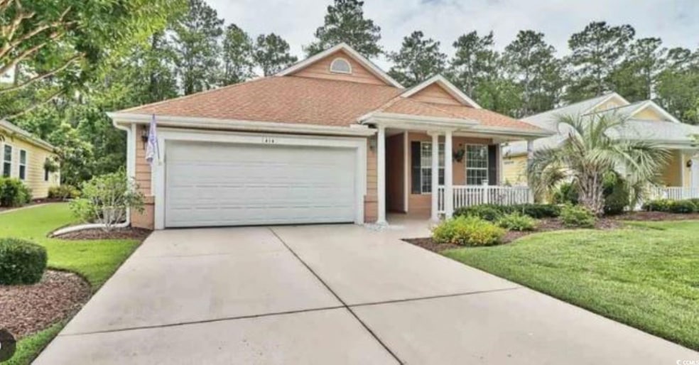View of front of house featuring a garage, a front