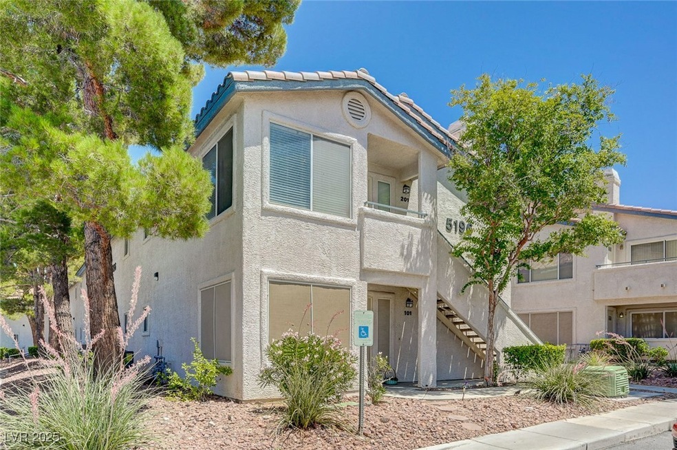 Multi unit property featuring stairway and stucco