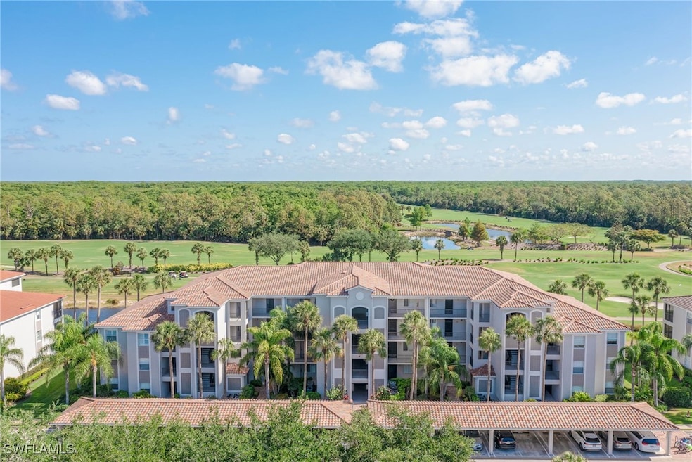 Birds eye view of property with a water view, golf course view, and a forest view