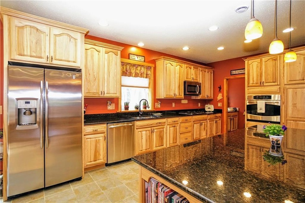 Gorgeous kitchen with gleaming granite.