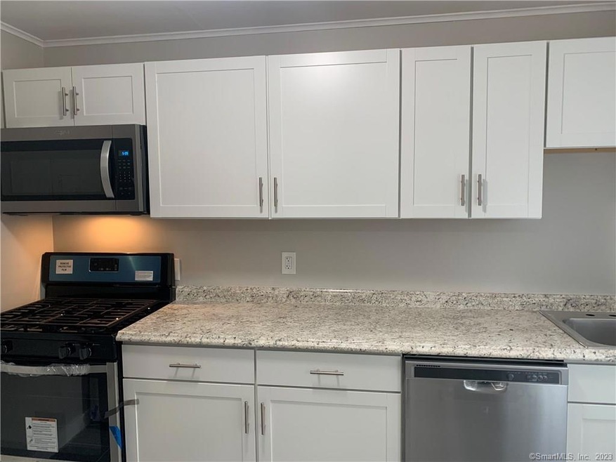 63 Mencel Cir unit A, Bridgeport, CT 06610 - photo 1