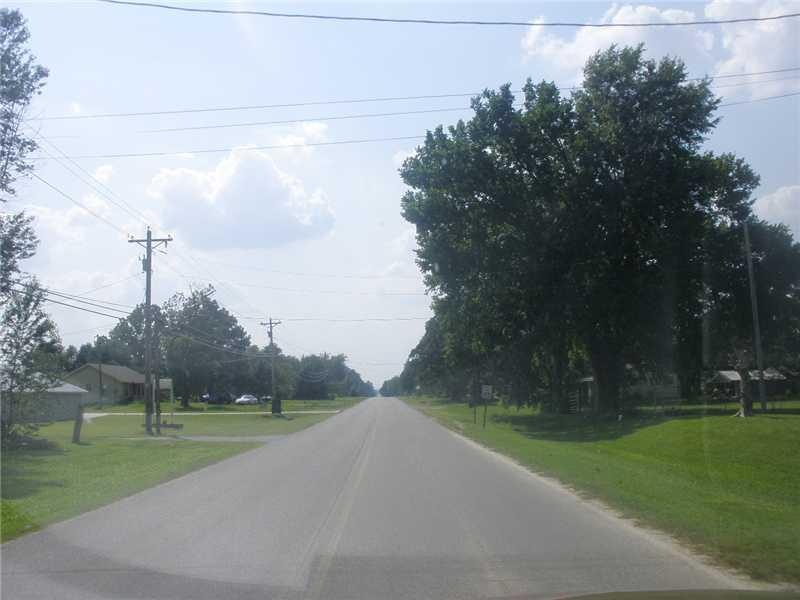 Exterior Front. Paved street , corner of Redbud an