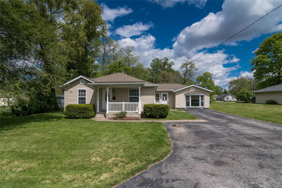 Beautiful and move in ready home nestled on a fully fenced level lot! This home contains 3 bedrooms - 2 full bathrooms, updates throughout, unfinished basement perfect for storage, and a desired backyard with a covered patio, pool, and firepit!